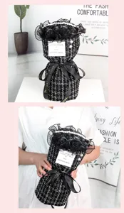 Black soap rose bouquet with tweed wrapping, pearl trim and ribbon for gifts detail view.
