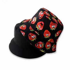 Reversible bucket hat with cute cartoon strawberry print, black casual sun protection hat.
