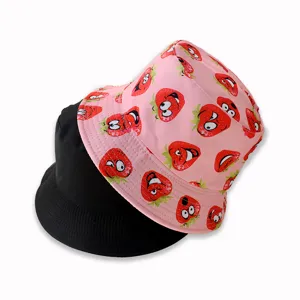Reversible bucket hat with cute strawberry print and classic black side for women.