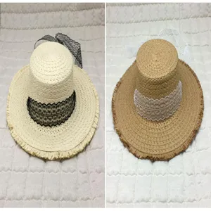 Comparison of cream and tan straw sun hats featuring elegant lace ribbon details.
