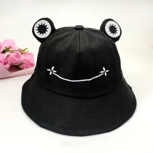 Cute black frog bucket hat with embroidered smile and plush eyes, spring summer sun hat streetwear.