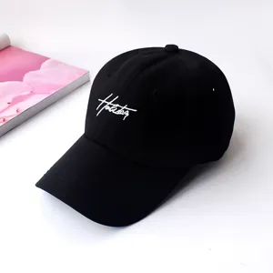Classic black baseball cap with white cursive embroidery, casual and stylish daily wear.