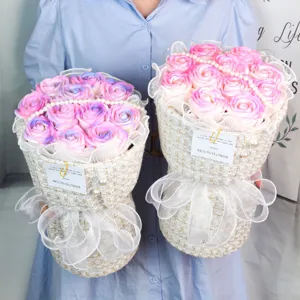 Elegant soap rose bouquet in tweed wrapping with pearls and ribbon, perfect romantic gift.