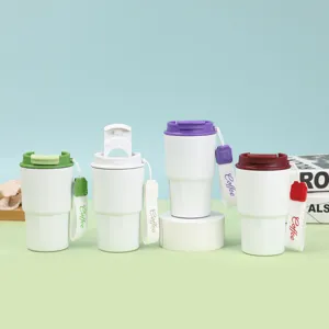 Tazza da caffè isolata portatile con coperchio a doppia beccuccio e cinturino per viaggi.