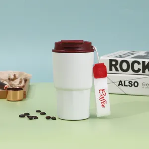 Tazza da caffè termica in acciaio inossidabile con coperchio e cinghia portatile.