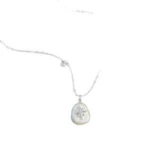 Elegant French style irregular cotton pearl necklace with a silver starburst pendant charm