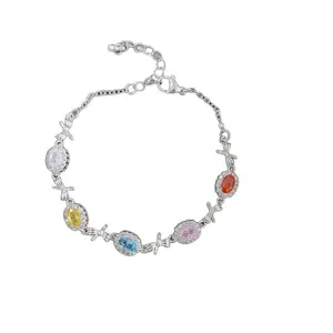 Elegante pulsera con circonitas de colores y diseño de lazos en tono plateado