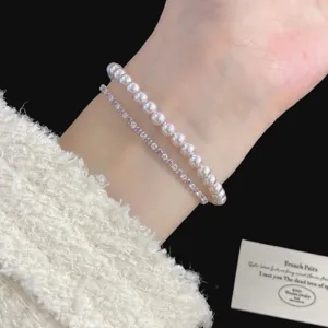 Elegante set de pulseras de perlas lavanda y circonitas moradas para mujer