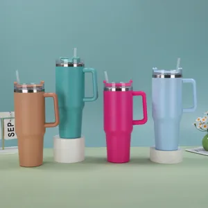 Detail of 40oz insulated stainless steel tumblers in four vibrant colors with straw