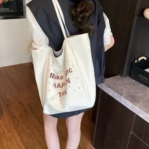 Minimalistische Damen Canvas Umhängetasche mit 'Make Magic Happen' Aufdruck