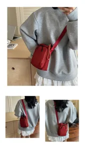 Rotes Umhängetasche Detail, lässige Handy- und Flaschentasche für Outdoor-Sportarten.