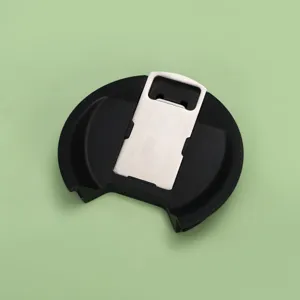 Detail view of portable tumbler lid with integrated metal bottle opener for stainless steel cups.