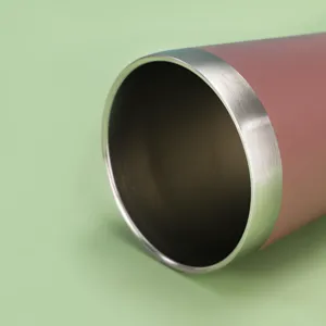 Stainless steel insulated tumbler cup detail shot, showing smooth rim and double wall.