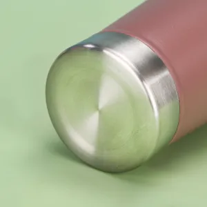 Stainless steel insulated cup bottom detail view, matte pink finish, durable metal base.