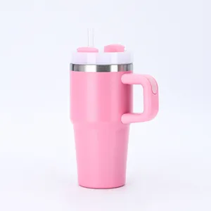 Side view of 20oz pink stainless steel insulated tumbler with straw and handle