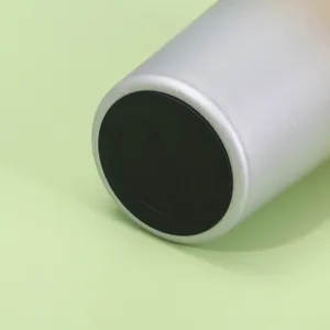 Detail view of the stainless steel insulated coffee tumbler bottom with rubber pad.
