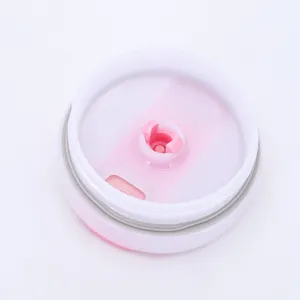 Close-up detail of spill-proof pink and white lid for 20oz stainless steel tumbler