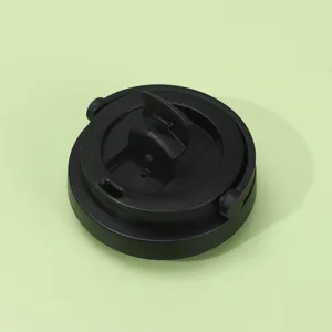 Close-up detail of a black thermos cup lid with portable folding handle and leak-proof spout.