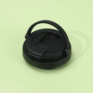 Detail view of the black portable thermos tumbler lid featuring a convenient folding handle.