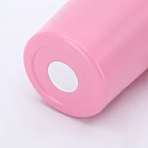 Detailed close-up showing the non-slip white base of the pink stainless steel tumbler