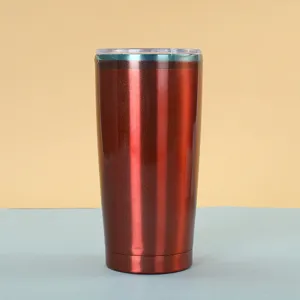 Detailed view of the 20oz stainless steel vacuum insulated tumbler with metallic red finish.