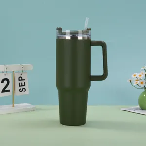 Detailed view of 40oz green insulated car tumbler with ergonomic handle and straw