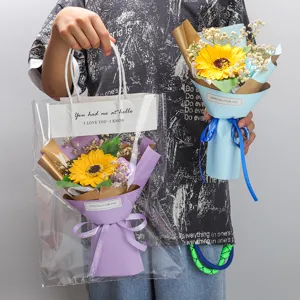 Graduation gift sunflower soap flower bouquet with transparent handbag for women and girls.
