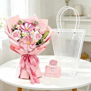 Handmade crochet pink flower bouquet set with a clear gift bag and greeting card
