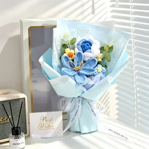 Close-up of handmade crochet flower bouquet with blue roses and Best Wishes card