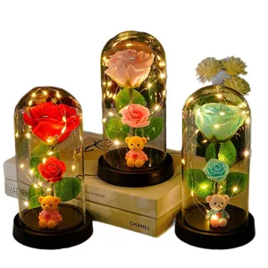 Glass dome rose flower with cute teddy bear and LED string lights, romantic gift for lovers.