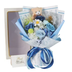 Elegant blue soap rose flower bouquet with a cute teddy bear and Best Wishes gift card