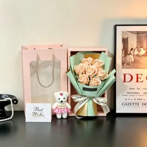 Elegant macro view of 7-piece soap rose flower gift set with teddy bear and greeting card