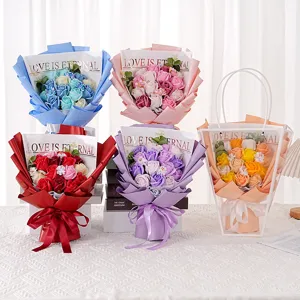 Detailed view of handmade soap rose bouquets in vibrant colors with decorative ribbons.
