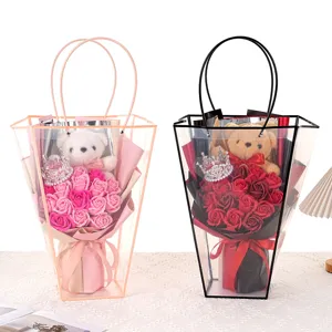 Soap rose bouquets with teddy bears in transparent gift bags for Valentine's Day gift