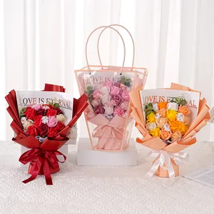 Detail of soap rose bouquets in red, pink, and orange with "Love is Eternal" packaging.