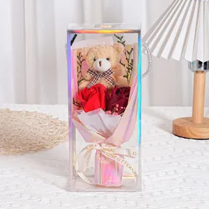 Exquisites Seifenrosen-Bouquet mit Teddybär in einer transparenten Geschenkbox zum Valentinstag
