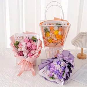 Detailed view of soap rose flower bouquets in pink orange and purple gift packaging