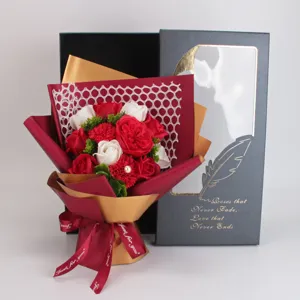Soap flower bouquet detail shot, romantic red and white roses with elegant gift box packaging.