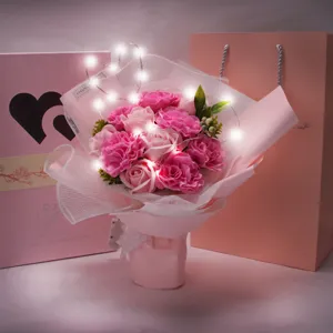 Pink soap flower bouquet with LED heart lights, perfect romantic gift for graduation or Valentine's.