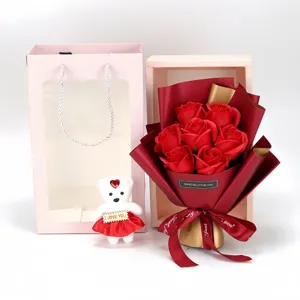 Detailed view of 7-count soap rose bouquet with plush teddy bear and pink gift bag