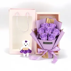 Detailed view of the 7-flower purple soap rose bouquet gift set with a white bear figurine