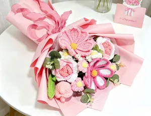 Close-up of a large handmade pink crochet flower bouquet for Valentine's Day gift