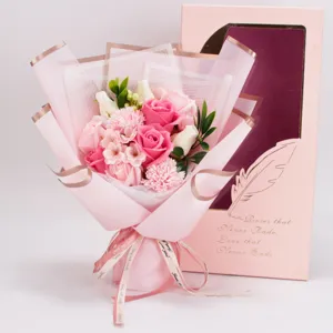 Pink soap flower bouquet gift box with roses and carnations for romantic occasions and gifts.