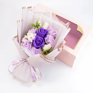 Soap flower bouquet gift box with purple roses and carnations for romantic valentines day.