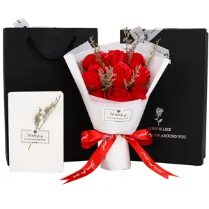 Gift set featuring 9 red soap roses bouquet with black gift bags and greeting card