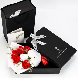 Detailed view of 9-piece simulation rose soap flower bouquet inside elegant black gift box