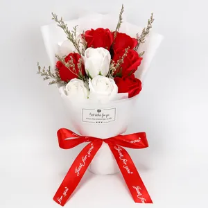 Detailed view of 9-stem red and white artificial rose soap flower bouquet gift