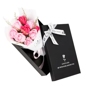 Detailed view of an exquisite 9-rose soap flower bouquet in a black gift box with ribbon