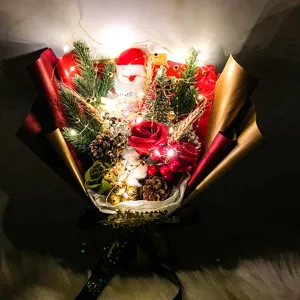 Χριστουγεννιάτικη ανθοδέσμη τριαντάφυλλου σαπουνιού με Άγιο Βασίλη και φωτάκια LED.
