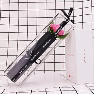 Detailed view of single pink carnation soap flower in transparent PVC gift box